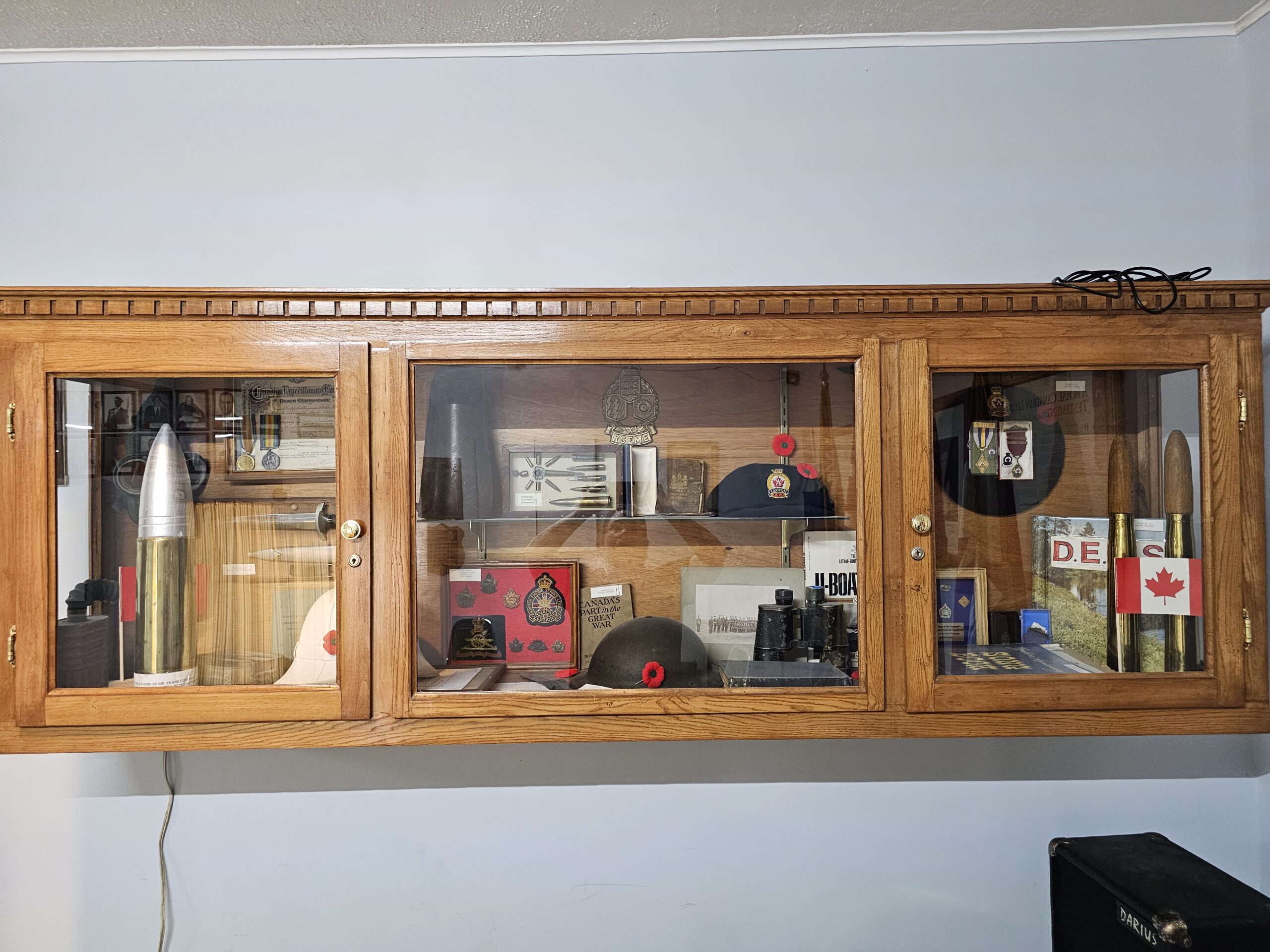 A case with memorabilia from all of the Canadian Armed Forces, of varying ages from many different conficts.